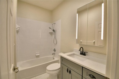 Welcome to this beautifully updated 2-bedroom, 2-bathroom home on Lake Ashton Golf Club in Florida - for sale on GolfHomes.com, golf home, golf lot