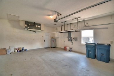 Welcome to this beautifully updated 2-bedroom, 2-bathroom home on Lake Ashton Golf Club in Florida - for sale on GolfHomes.com, golf home, golf lot