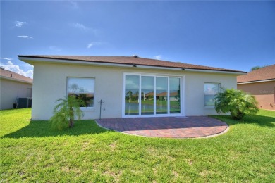 Welcome to this beautifully updated 2-bedroom, 2-bathroom home on Lake Ashton Golf Club in Florida - for sale on GolfHomes.com, golf home, golf lot