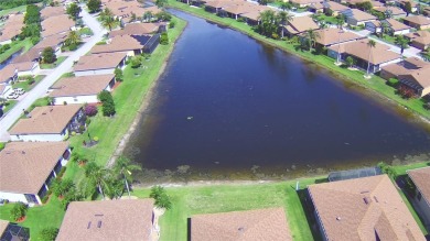 Welcome to this beautifully updated 2-bedroom, 2-bathroom home on Lake Ashton Golf Club in Florida - for sale on GolfHomes.com, golf home, golf lot