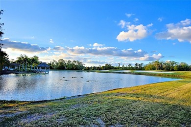 Welcome to this beautifully updated 2-bedroom, 2-bathroom home on Lake Ashton Golf Club in Florida - for sale on GolfHomes.com, golf home, golf lot