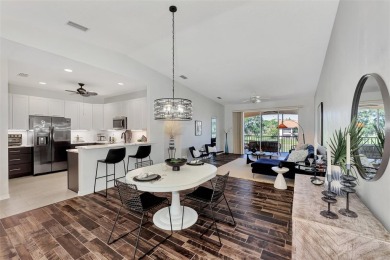 Refined elegance in Gondola Park. This second-floor residence on Capri Isle Golf Club in Florida - for sale on GolfHomes.com, golf home, golf lot