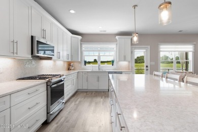 This beautiful 3-bedroom, 2.5-bath custom-built home with two on North River Club in North Carolina - for sale on GolfHomes.com, golf home, golf lot