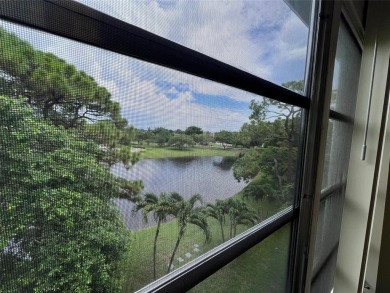 HIGHLY DESIRABLE BUILDING LOCATED DIRECTLY IN FRONT OF THE on Hillsboro Pines Golf in Florida - for sale on GolfHomes.com, golf home, golf lot