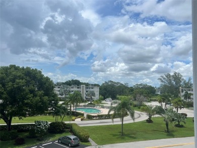 HIGHLY DESIRABLE BUILDING LOCATED DIRECTLY IN FRONT OF THE on Hillsboro Pines Golf in Florida - for sale on GolfHomes.com, golf home, golf lot