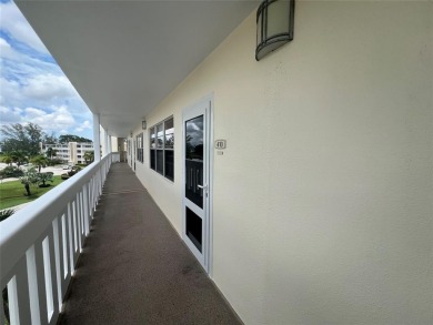 HIGHLY DESIRABLE BUILDING LOCATED DIRECTLY IN FRONT OF THE on Hillsboro Pines Golf in Florida - for sale on GolfHomes.com, golf home, golf lot