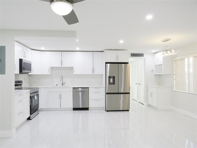 Experience luxury living in the highly desirable Kings Point on Kings Point Golf -Flanders Way in Florida - for sale on GolfHomes.com, golf home, golf lot