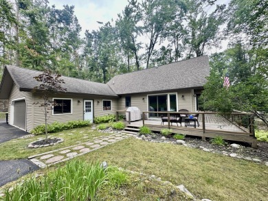 Private northern MI retreat! Renovated 1,428 sq ft chalet on 2 on The Loon Golf Resort in Michigan - for sale on GolfHomes.com, golf home, golf lot