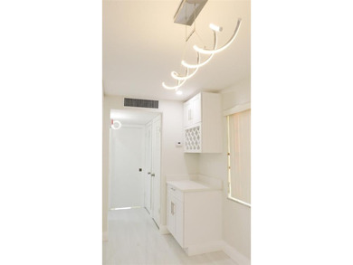 Experience luxury living in the highly desirable Kings Point on Kings Point Golf -Flanders Way in Florida - for sale on GolfHomes.com, golf home, golf lot