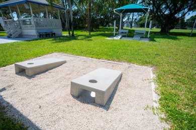HIGHLY DESIRABLE BUILDING LOCATED DIRECTLY IN FRONT OF THE on Hillsboro Pines Golf in Florida - for sale on GolfHomes.com, golf home, golf lot