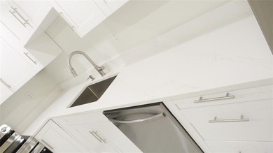 Experience luxury living in the highly desirable Kings Point on Kings Point Golf -Flanders Way in Florida - for sale on GolfHomes.com, golf home, golf lot