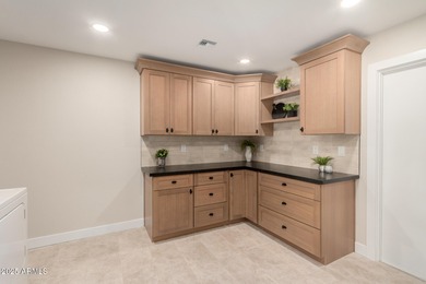 COMPLETELY RE-IMAGINED from top to bottom this STUNNING REMODEL on Cottonwood Country Club in Arizona - for sale on GolfHomes.com, golf home, golf lot