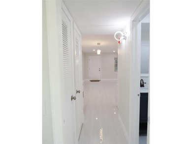 Experience luxury living in the highly desirable Kings Point on Kings Point Golf -Flanders Way in Florida - for sale on GolfHomes.com, golf home, golf lot