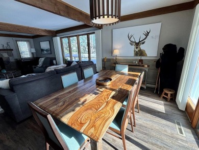 Private northern MI retreat! Renovated 1,428 sq ft chalet on 2 on The Loon Golf Resort in Michigan - for sale on GolfHomes.com, golf home, golf lot