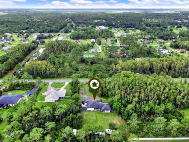 Welcome to Wedgefield Living -- your private sanctuary where on Wedgefield Golf Club in Florida - for sale on GolfHomes.com, golf home, golf lot
