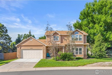 From the moment you arrive in the ever-popular Golden Meadows on Collindale Golf Course in Colorado - for sale on GolfHomes.com, golf home, golf lot