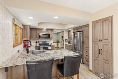 From the moment you arrive in the ever-popular Golden Meadows on Collindale Golf Course in Colorado - for sale on GolfHomes.com, golf home, golf lot