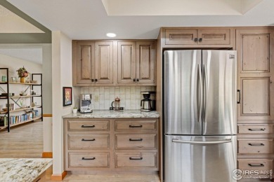 From the moment you arrive in the ever-popular Golden Meadows on Collindale Golf Course in Colorado - for sale on GolfHomes.com, golf home, golf lot