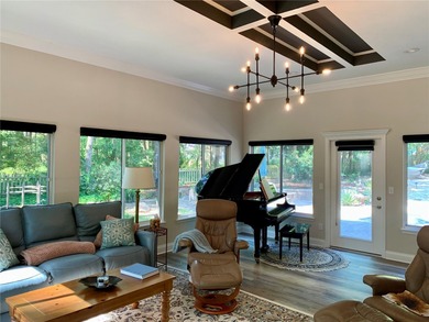 Discover refined elegance in this completely updated on Haile Plantation Golf and Country Club in Florida - for sale on GolfHomes.com, golf home, golf lot