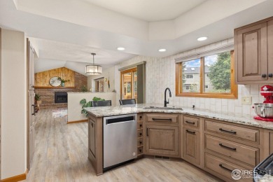 From the moment you arrive in the ever-popular Golden Meadows on Collindale Golf Course in Colorado - for sale on GolfHomes.com, golf home, golf lot