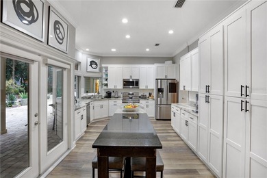 Discover refined elegance in this completely updated on Haile Plantation Golf and Country Club in Florida - for sale on GolfHomes.com, golf home, golf lot