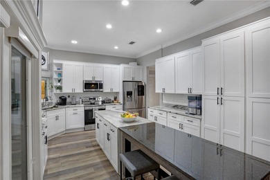 Discover refined elegance in this completely updated on Haile Plantation Golf and Country Club in Florida - for sale on GolfHomes.com, golf home, golf lot