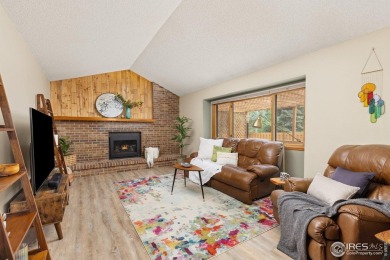 From the moment you arrive in the ever-popular Golden Meadows on Collindale Golf Course in Colorado - for sale on GolfHomes.com, golf home, golf lot