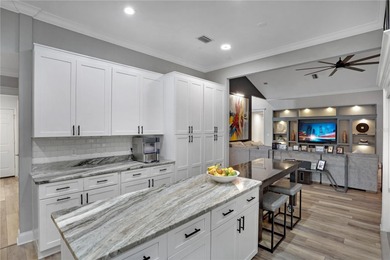 Discover refined elegance in this completely updated on Haile Plantation Golf and Country Club in Florida - for sale on GolfHomes.com, golf home, golf lot