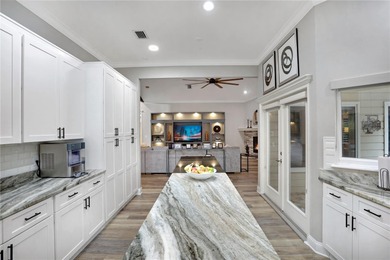 Discover refined elegance in this completely updated on Haile Plantation Golf and Country Club in Florida - for sale on GolfHomes.com, golf home, golf lot