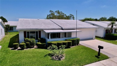 THE PHILODENDRON MODEL IS A BEAUTIFUL SPLIT BEDROOM HOME THAT on Mainlands Golf Club in Florida - for sale on GolfHomes.com, golf home, golf lot