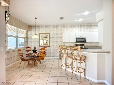 This professionally decorated home in HERONS GLEN COUNTRY CLUB on Herons Glen Golf and Country Club in Florida - for sale on GolfHomes.com, golf home, golf lot