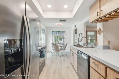 Don't miss this well-maintained Oakmont model featuring 2 on Timber Pines Golf Course in Florida - for sale on GolfHomes.com, golf home, golf lot