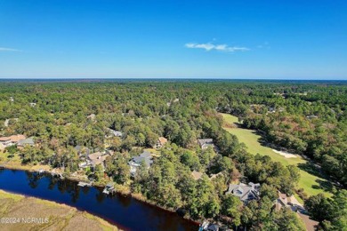 Incredible Expansive Views! This property located on the on Carolina National Golf Club in North Carolina - for sale on GolfHomes.com, golf home, golf lot