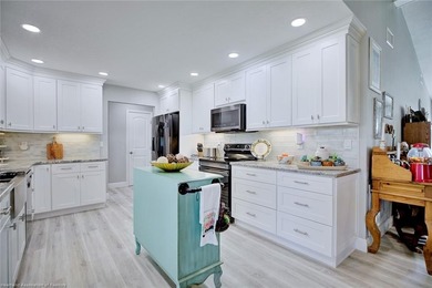 This beautifully remodeled home sits on a double lot with a on  in Florida - for sale on GolfHomes.com, golf home, golf lot