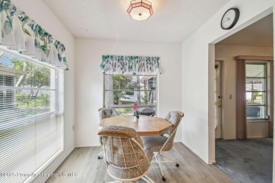 Don't miss this well-maintained Oakmont model featuring 2 on Timber Pines Golf Course in Florida - for sale on GolfHomes.com, golf home, golf lot