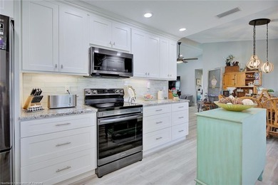 This beautifully remodeled home sits on a double lot with a on  in Florida - for sale on GolfHomes.com, golf home, golf lot