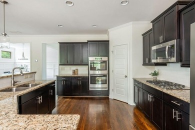 Welcome to 371 Hooper Street, a classic East Lake home tucked on East Lake Golf Club in Georgia - for sale on GolfHomes.com, golf home, golf lot