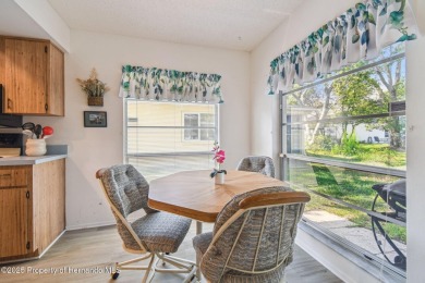 Don't miss this well-maintained Oakmont model featuring 2 on Timber Pines Golf Course in Florida - for sale on GolfHomes.com, golf home, golf lot