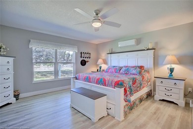 This beautifully remodeled home sits on a double lot with a on  in Florida - for sale on GolfHomes.com, golf home, golf lot