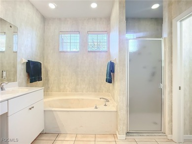 This professionally decorated home in HERONS GLEN COUNTRY CLUB on Herons Glen Golf and Country Club in Florida - for sale on GolfHomes.com, golf home, golf lot