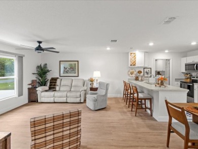Built in 2023 and thoughtfully upgraded with luxury vinyl plank on Marion Oaks Country Club in Florida - for sale on GolfHomes.com, golf home, golf lot