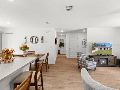 Built in 2023 and thoughtfully upgraded with luxury vinyl plank on Marion Oaks Country Club in Florida - for sale on GolfHomes.com, golf home, golf lot