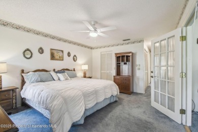 Don't miss this well-maintained Oakmont model featuring 2 on Timber Pines Golf Course in Florida - for sale on GolfHomes.com, golf home, golf lot