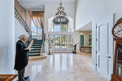 Experience one of Lake Havasu's most iconic residences, a true on London Bridge Golf Course in Arizona - for sale on GolfHomes.com, golf home, golf lot