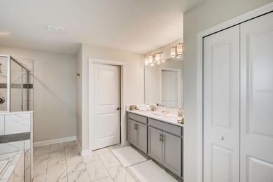 Welcome to this elegant 6-bedroom, 6-bath residence located in on National Golf Course in Florida - for sale on GolfHomes.com, golf home, golf lot