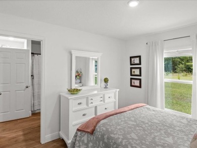 Built in 2023 and thoughtfully upgraded with luxury vinyl plank on Marion Oaks Country Club in Florida - for sale on GolfHomes.com, golf home, golf lot