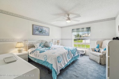 Don't miss this well-maintained Oakmont model featuring 2 on Timber Pines Golf Course in Florida - for sale on GolfHomes.com, golf home, golf lot