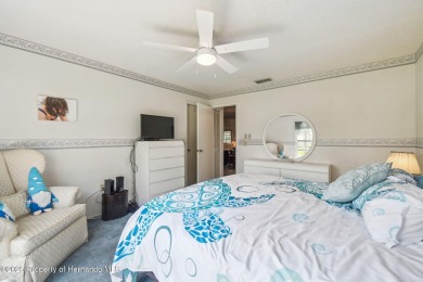 Don't miss this well-maintained Oakmont model featuring 2 on Timber Pines Golf Course in Florida - for sale on GolfHomes.com, golf home, golf lot