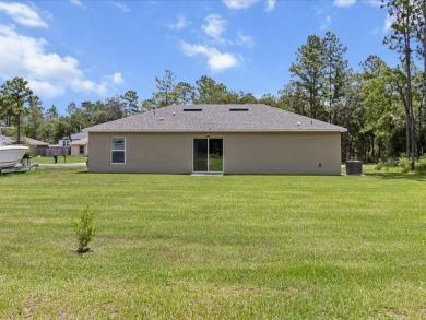 Built in 2023 and thoughtfully upgraded with luxury vinyl plank on Marion Oaks Country Club in Florida - for sale on GolfHomes.com, golf home, golf lot