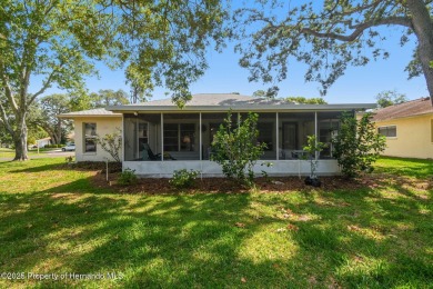 Don't miss this well-maintained Oakmont model featuring 2 on Timber Pines Golf Course in Florida - for sale on GolfHomes.com, golf home, golf lot